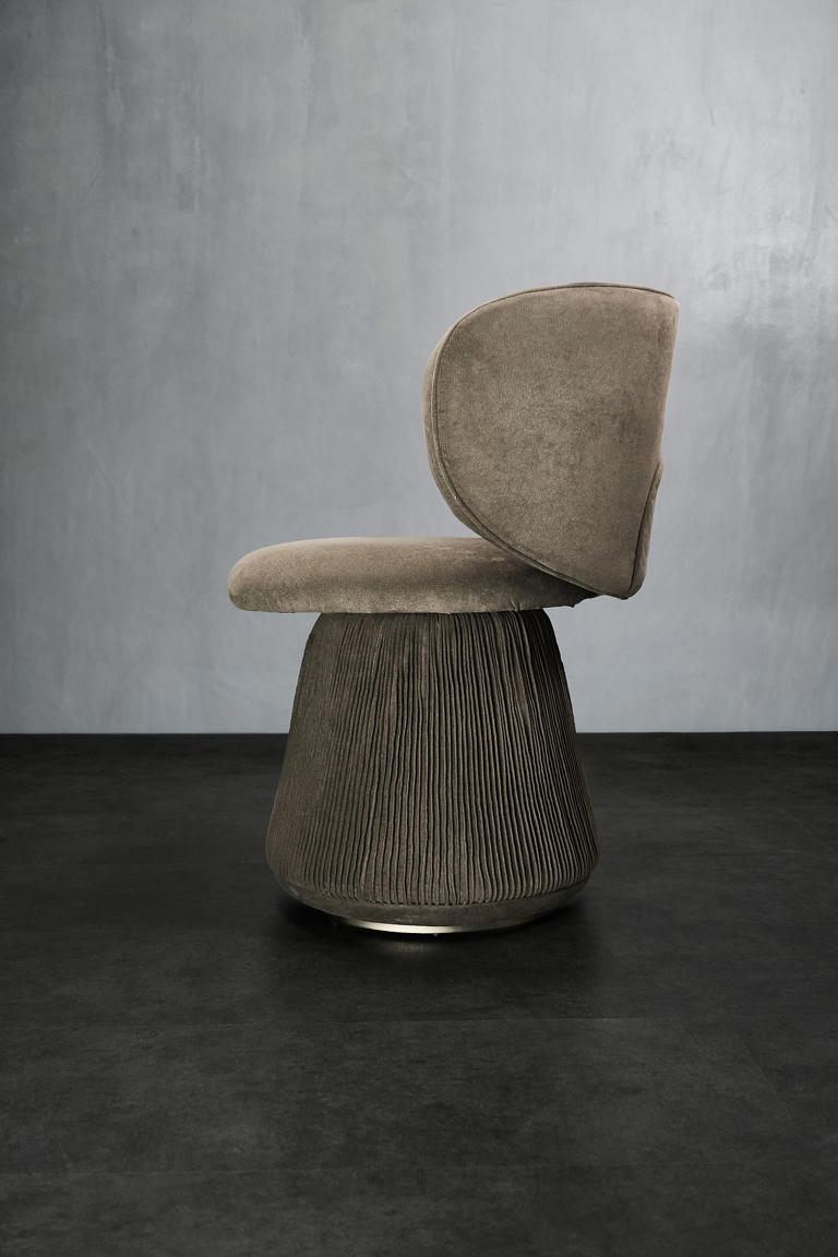 Material contrast takes centre stage in this contemporary furniture ...