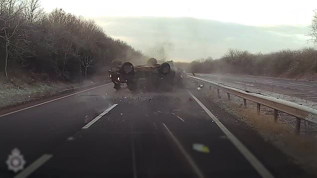 Military vehicle flies into the air in crash as driver given suspended ...