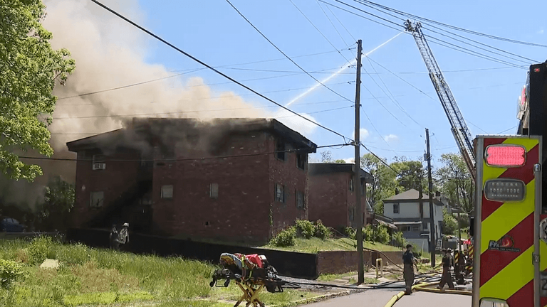 Heavy smoke billows from roof as crews surround Birmingham apartment fire