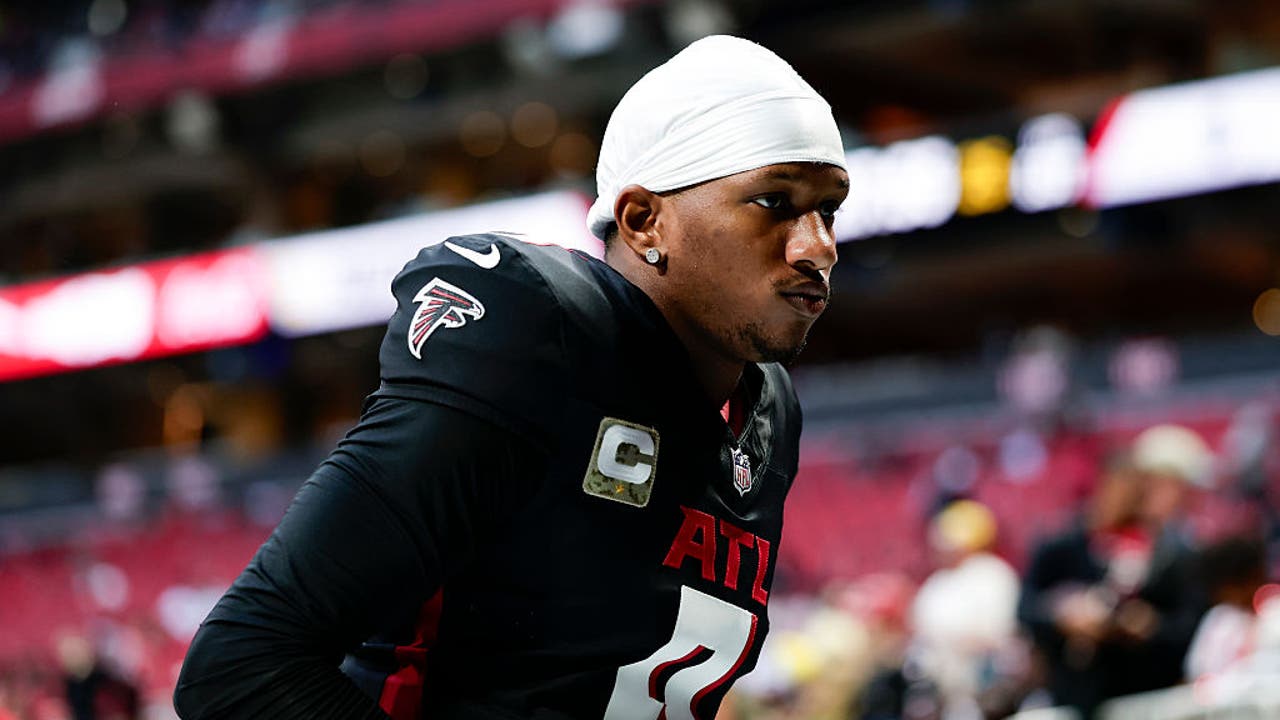 Ex-football player accused of posing as former UW QB Michael Penix ...