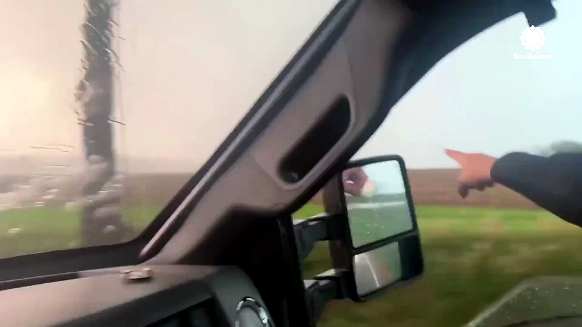 Storm chasers intercept tornado in Illinois as it downs power poles