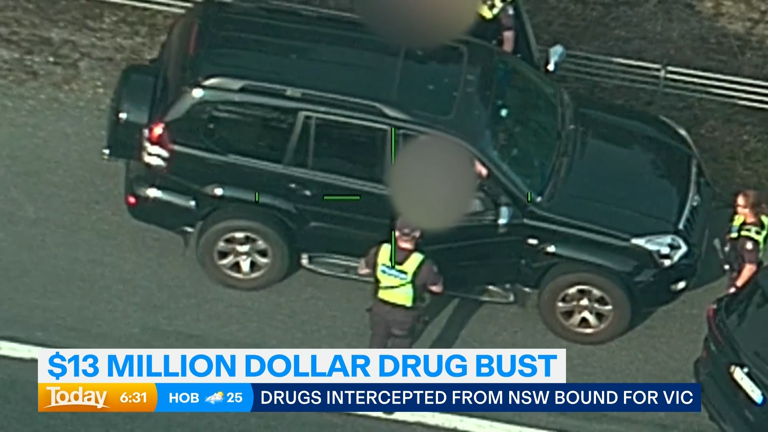 Police have charged two people over allegedly attempting to smuggle $13 million worth of drugs between NSW and Victoria.