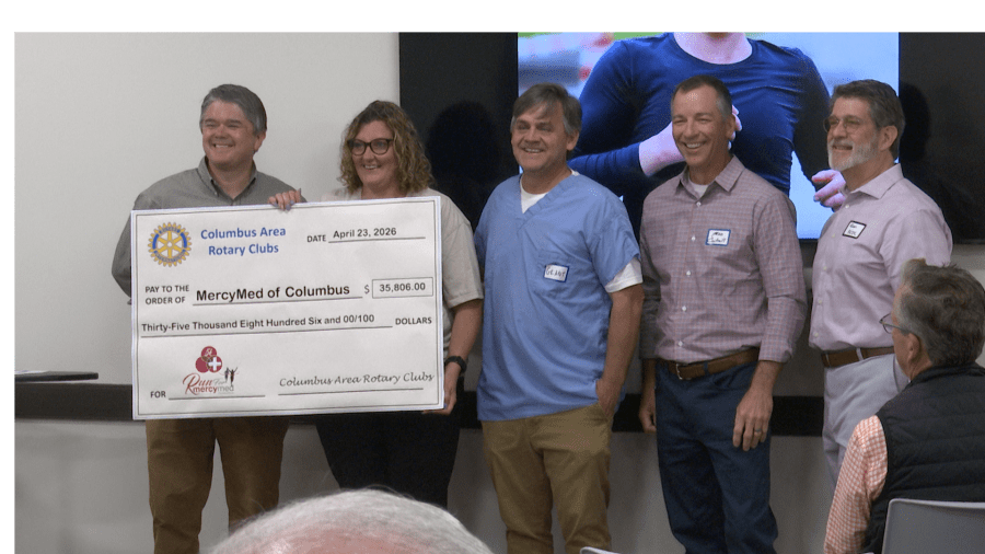 Columbus Rotary Clubs present check to Mercy Med