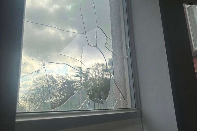 Family woken by brick crashing through living room window in Tranmere