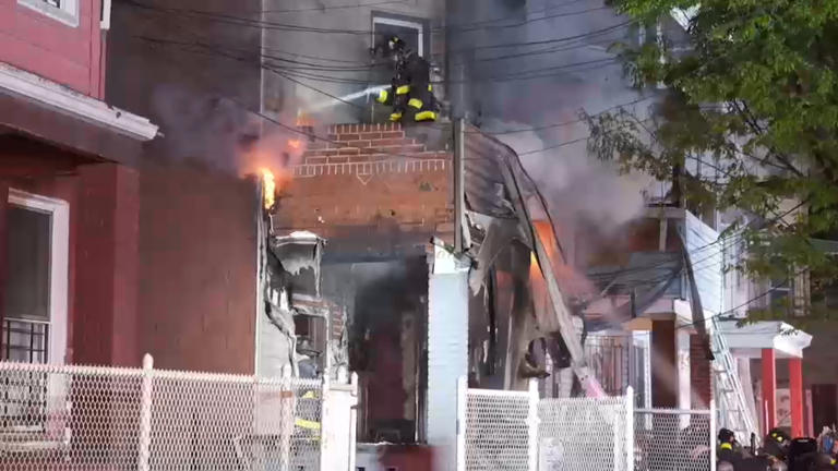 Fire burns through 2 homes in the Bronx, 20 residents displaced