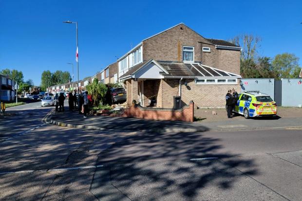 Home badly damaged after car crashes through wall