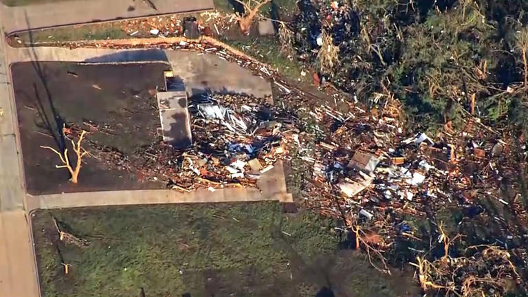 Enid, Oklahoma, surveys damage after massive tornado tears through city