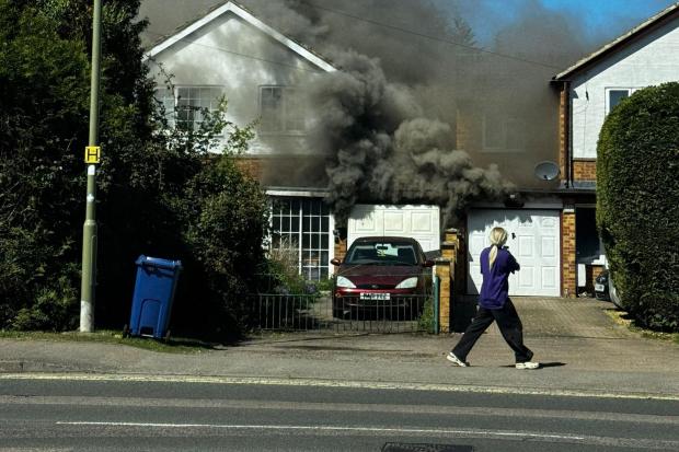 House catches fire as flames can be seen billowing in sky