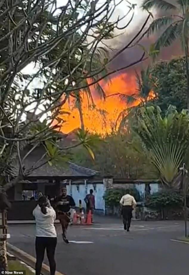Dramatic scenes as a fire rips through Club Med Bali resort, forcing ...