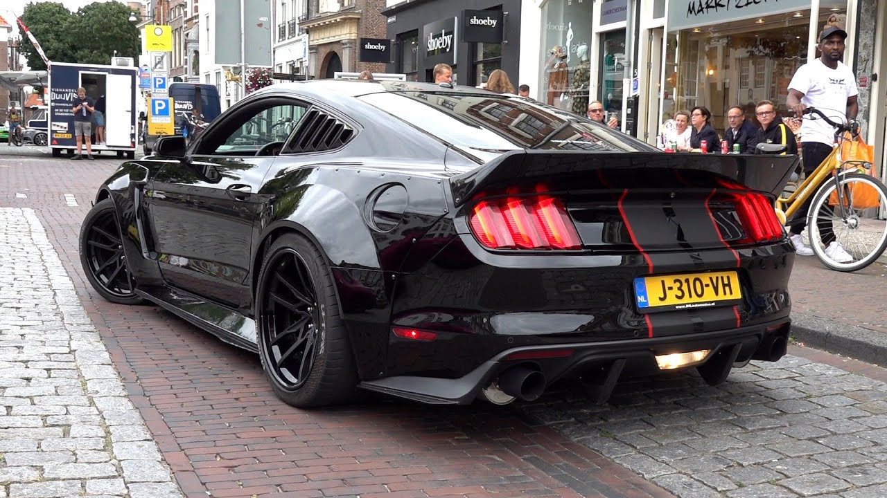 Ford Mustang widebody black rear view street custom build