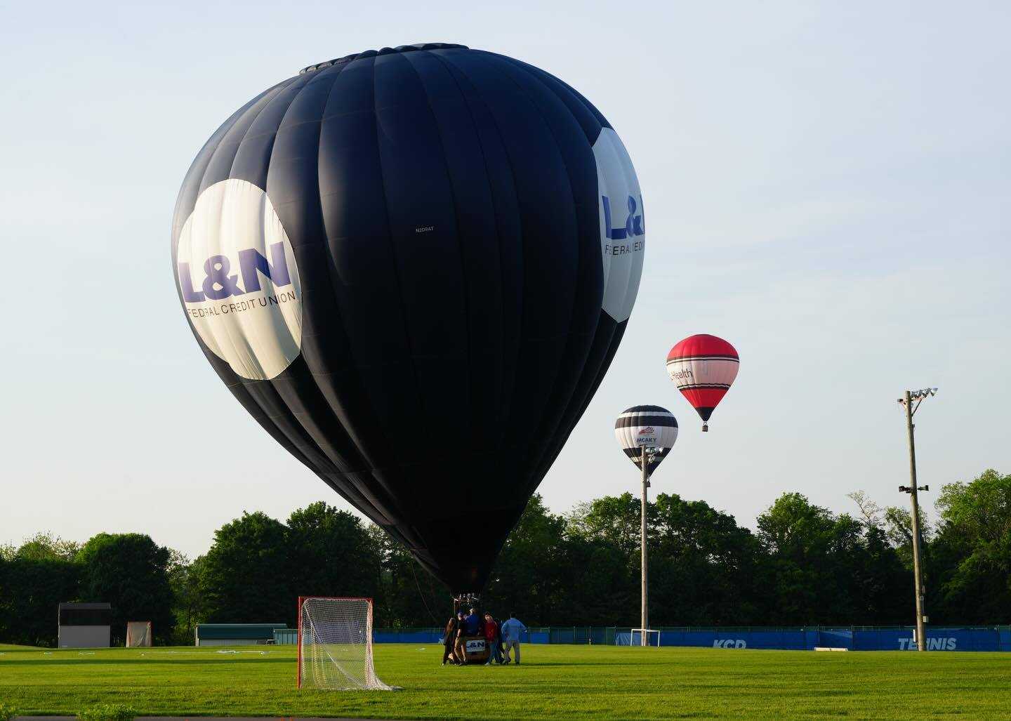 Great Balloon Rush-Hour Race reroutes, lands on school's sports field