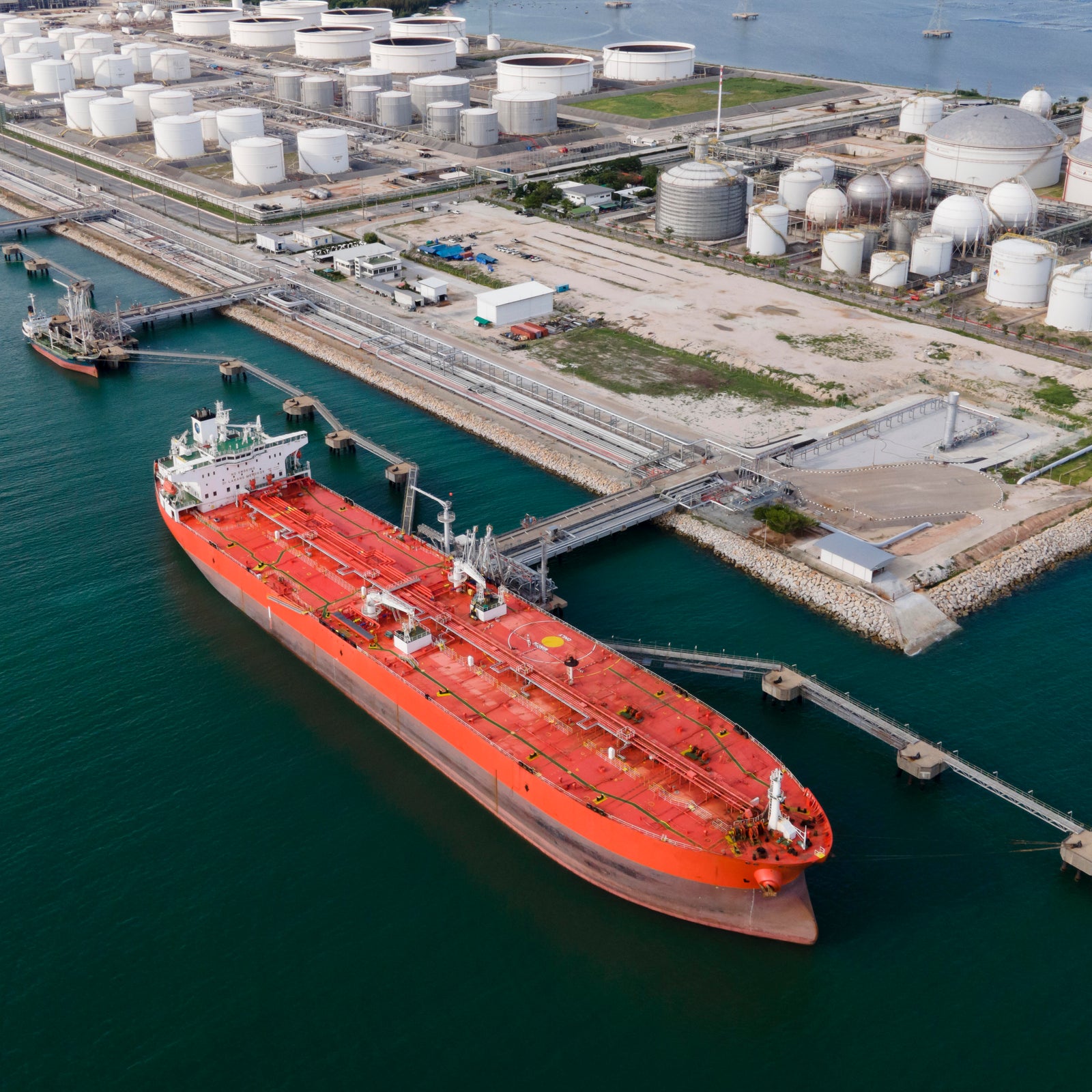 Aerial View of Crude Oil Tanker and Storage Tanks