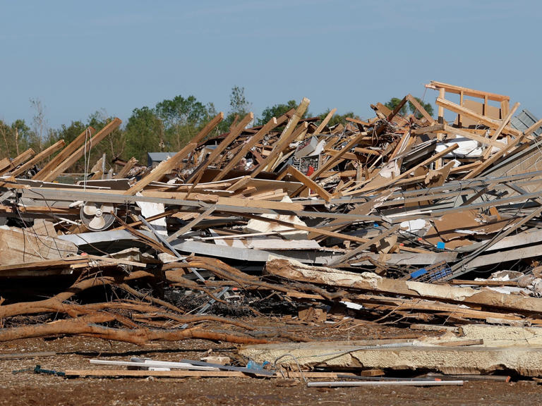 Enid, Oklahoma, surveys damage after massive tornado tears through city