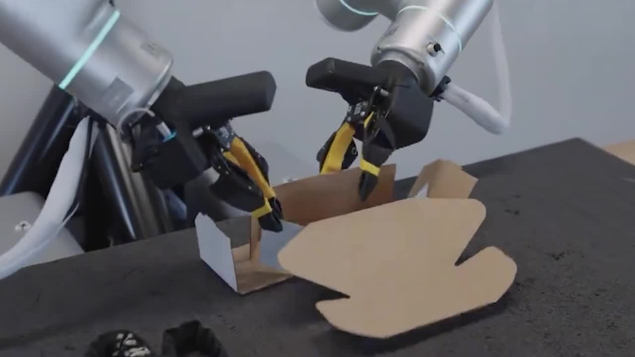 Impressive moment robot folds flat parcel box for shipping