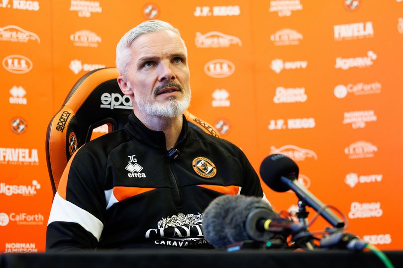 Jim Goodwin gets inside track on Marink Reedijk ahead of Dundee United ...