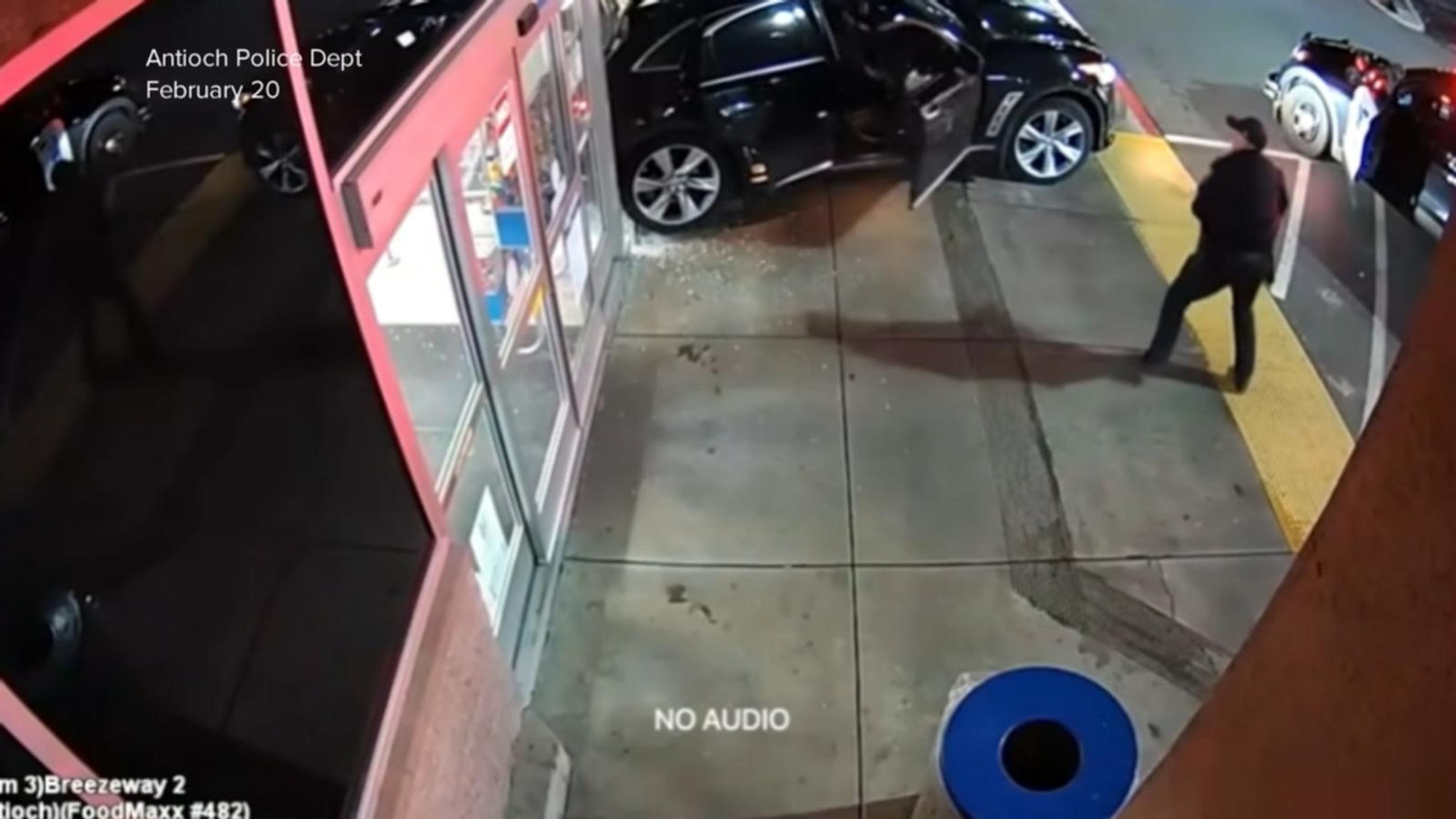 Newly released video shows a suspect driving off with a police officer ...