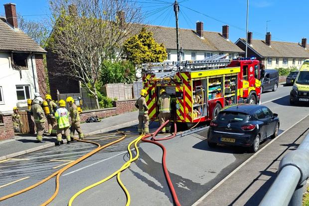 Man taken to hospital after fire destroys his home