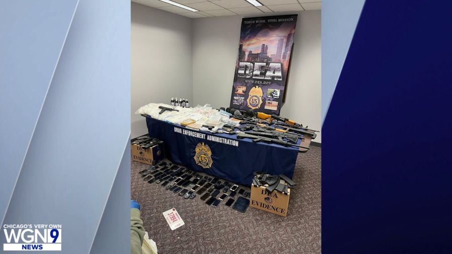 Alleged drug trafficker arrested; cache of guns, narcotics found