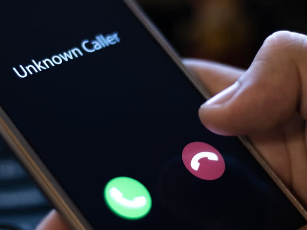 Hooked by a fake telco call: Malaysian man nabbed as Singapore flags ...