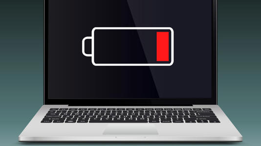 A laptop with low battery sign