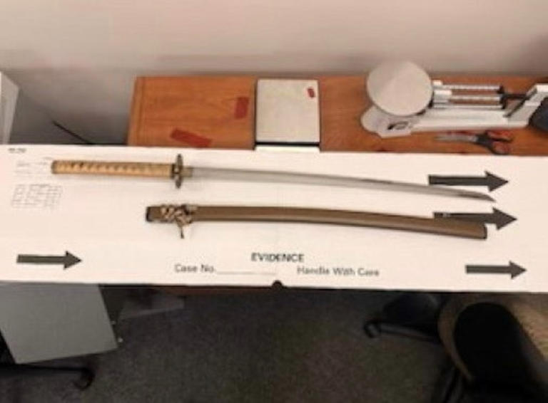 Man armed with lit torch, samurai sword arrested for starting fire in ...