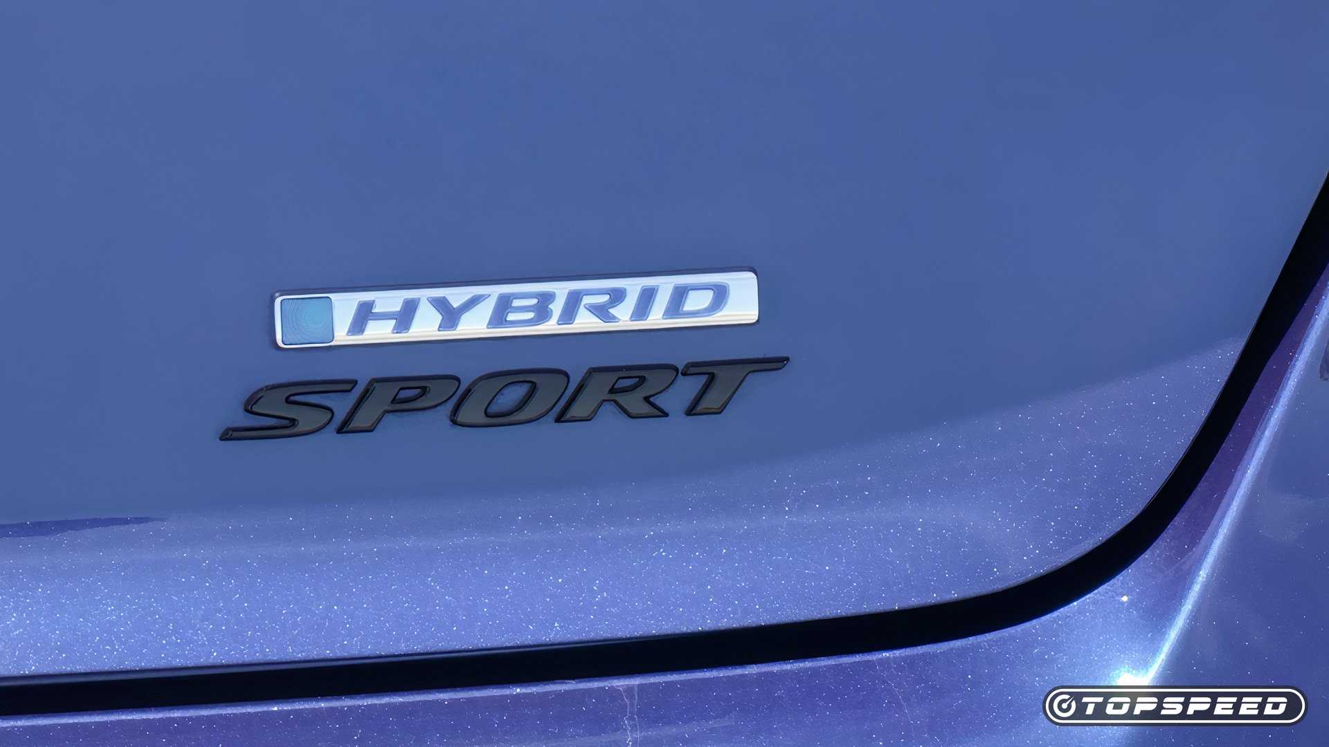 Close-up shot of a Honda Accord Hybrid Exterior Hybrid Sport Badge