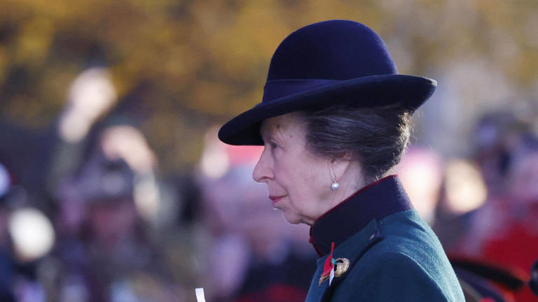 Princess Anne looks regal in emerald green coat and hat at dawn Anzac Day  service