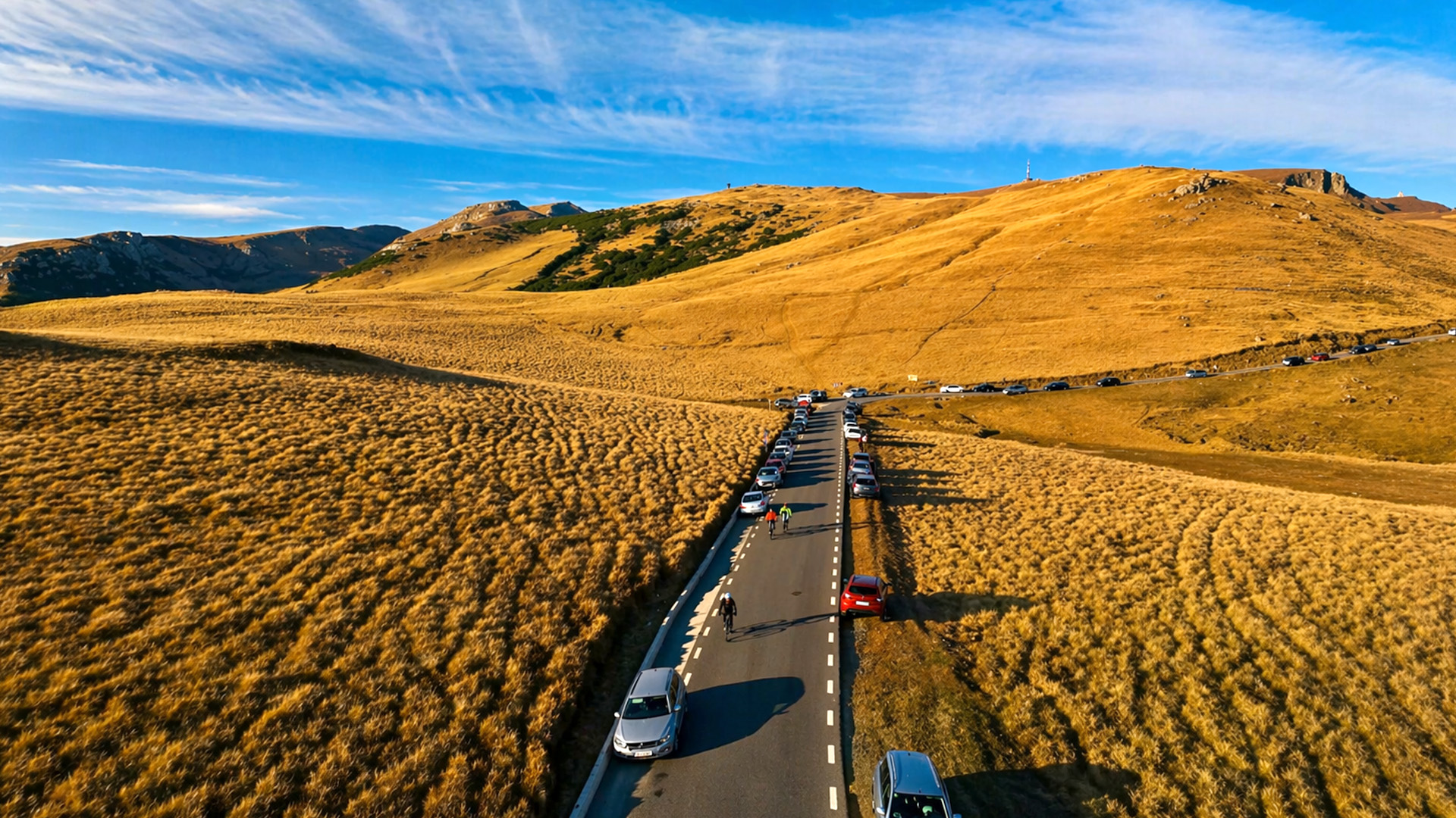 How did these rolling fields form across the mountains?