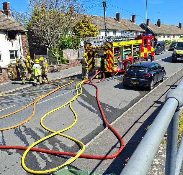 Man taken to hospital after fire destroys his home