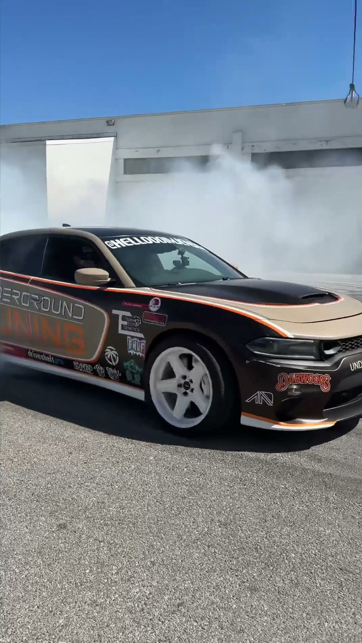 Intense Hellcat drifting action with extreme tire smoke