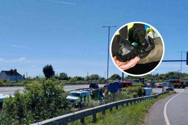 Woman arrested after four taken to hospital in ambulance crash