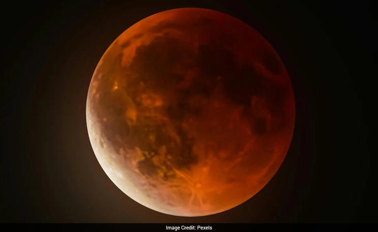 Scientists warn Mars's closest moon could destroy itself with falling ...