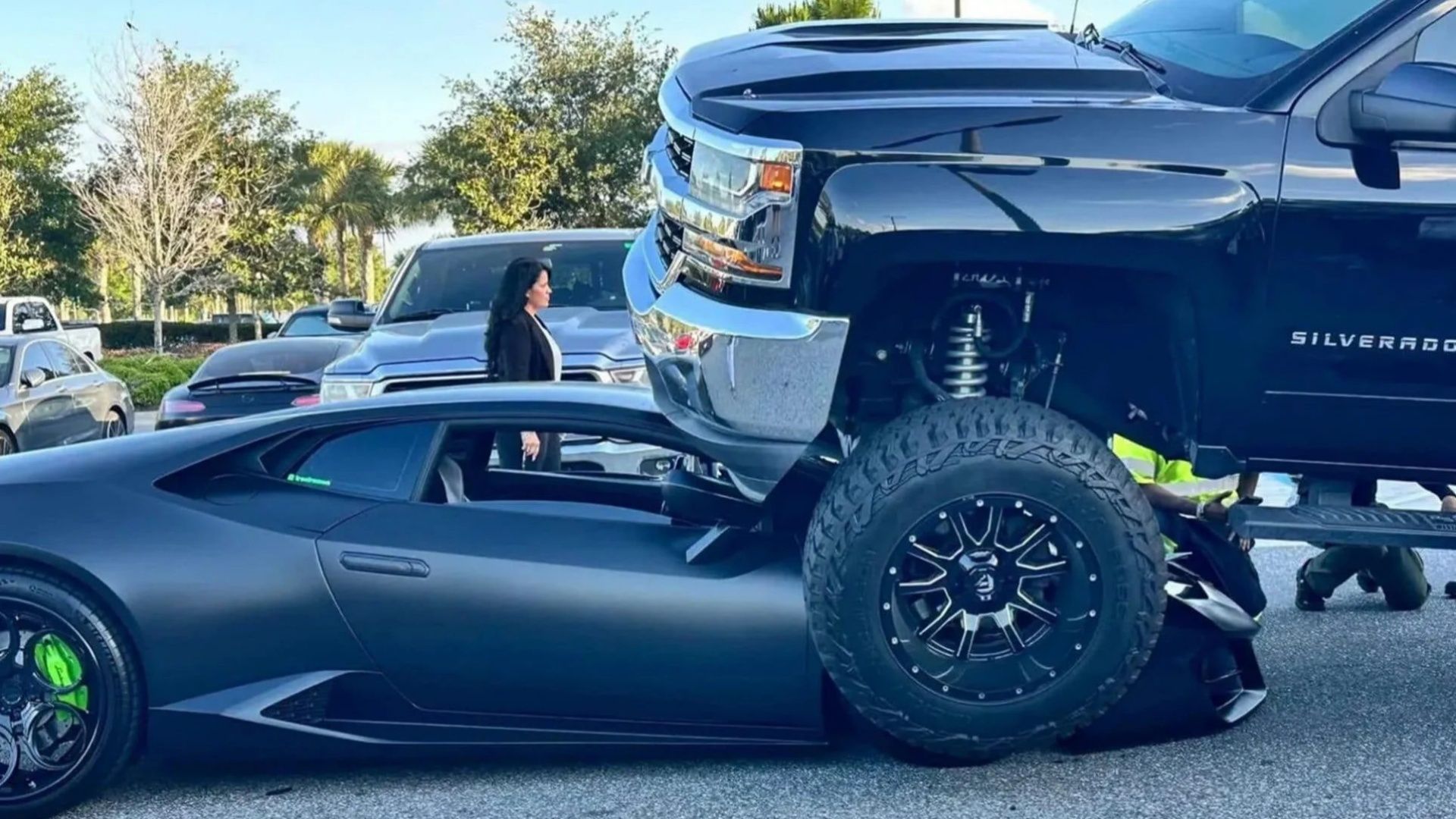 Lifted Chevy mounts $340,000 Lamborghini in parking lot accident