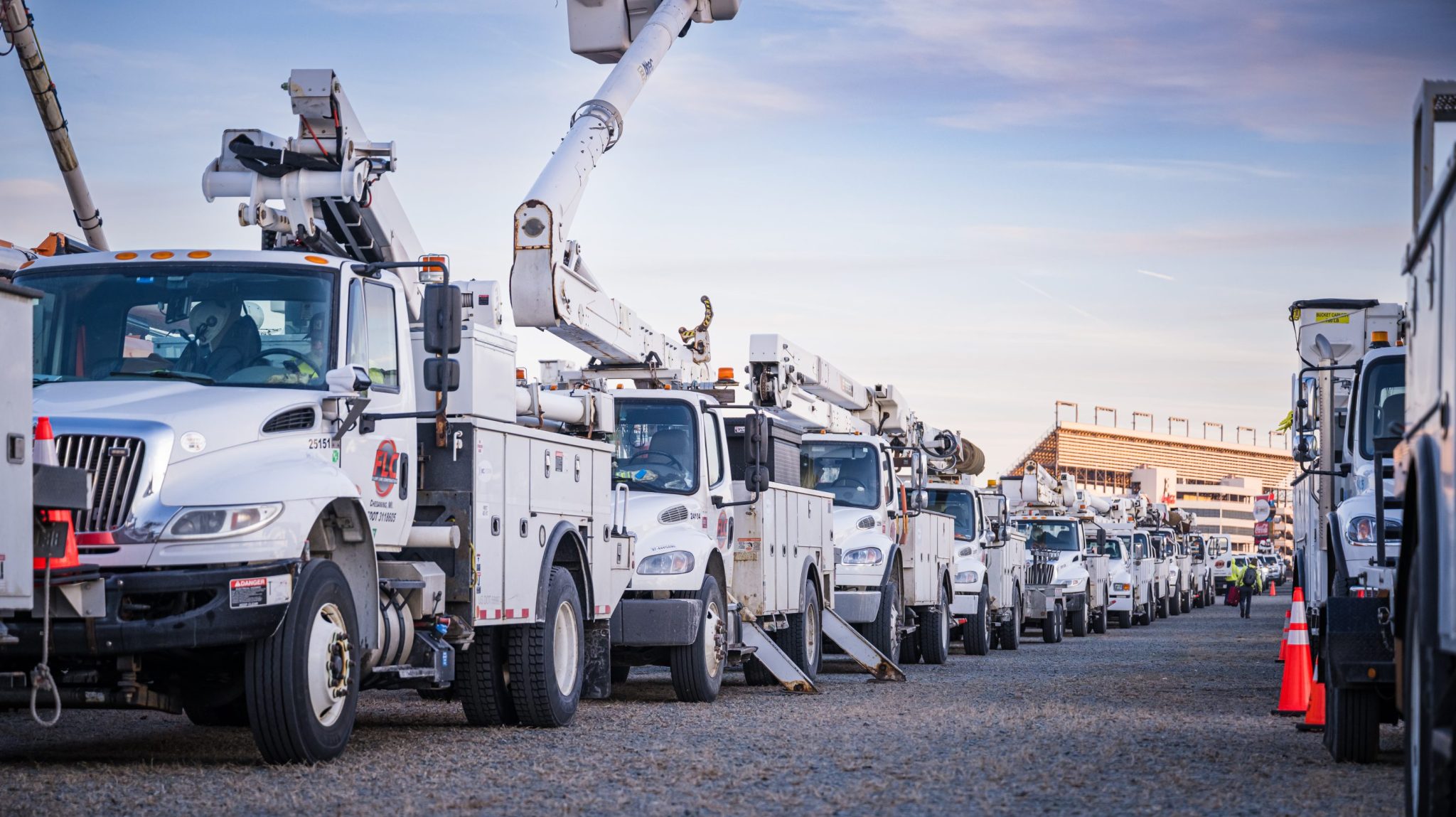 Duke Energy trucks amassed in January at the Charlotte Motor Speedway to help restore power after Winter Storm Fern.