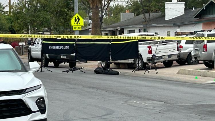 1 detained after man found shot dead in truck in north Phoenix neighborhood