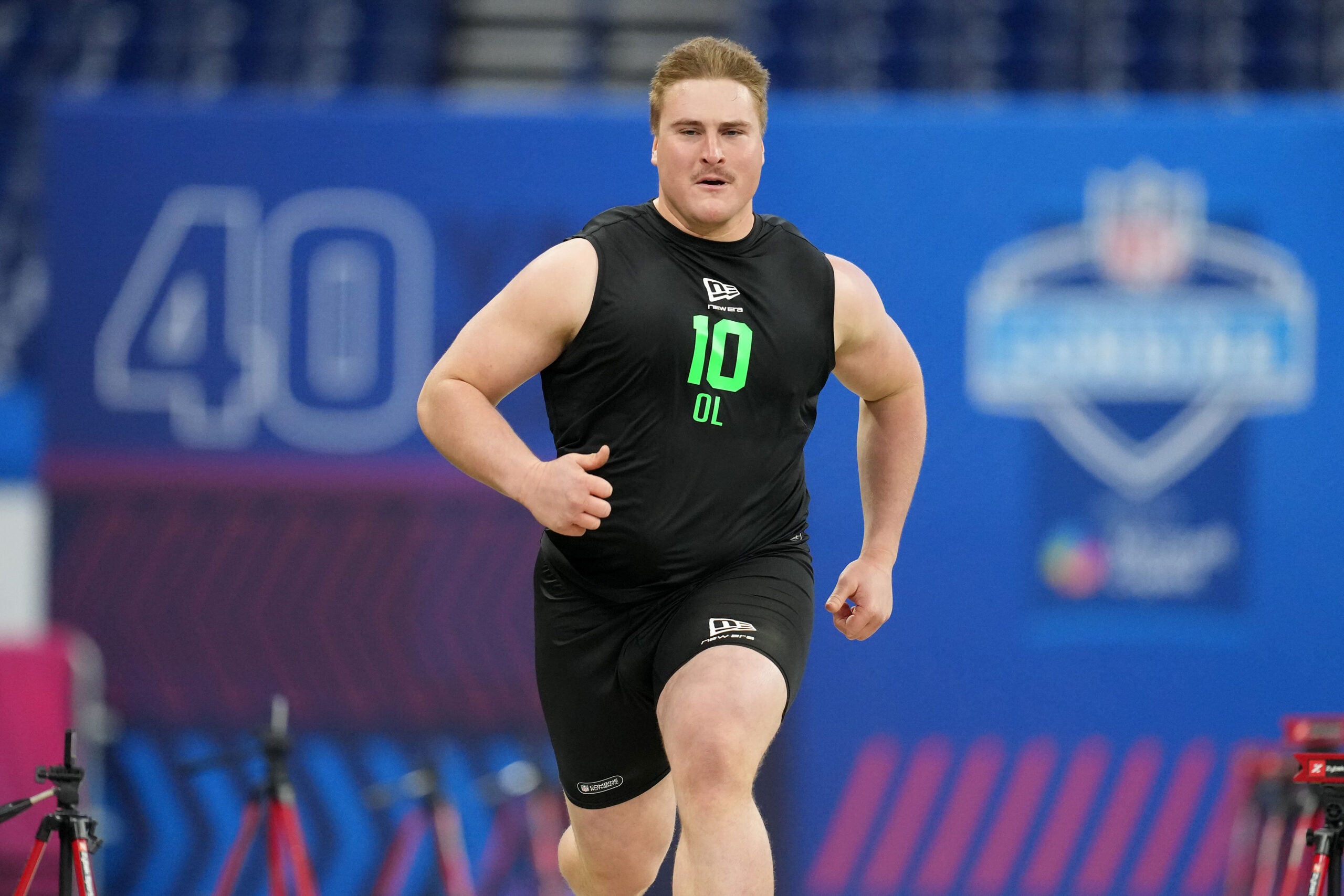Grading the pick: Packers take first offensive swing of draft with ...