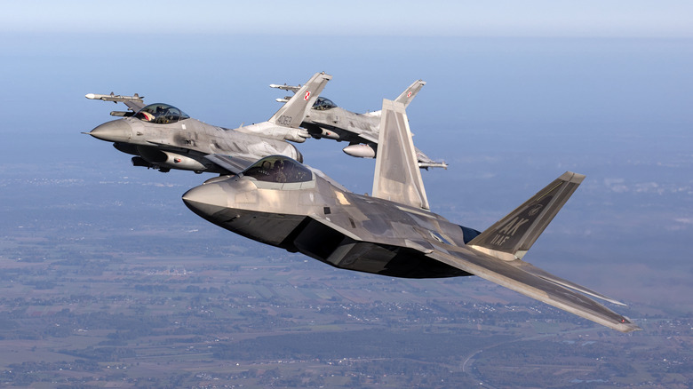 Why do fighter jets fly so close to each other?