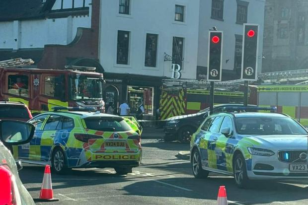 Man arrested after two pedestrians seriously injured in fire engine crash