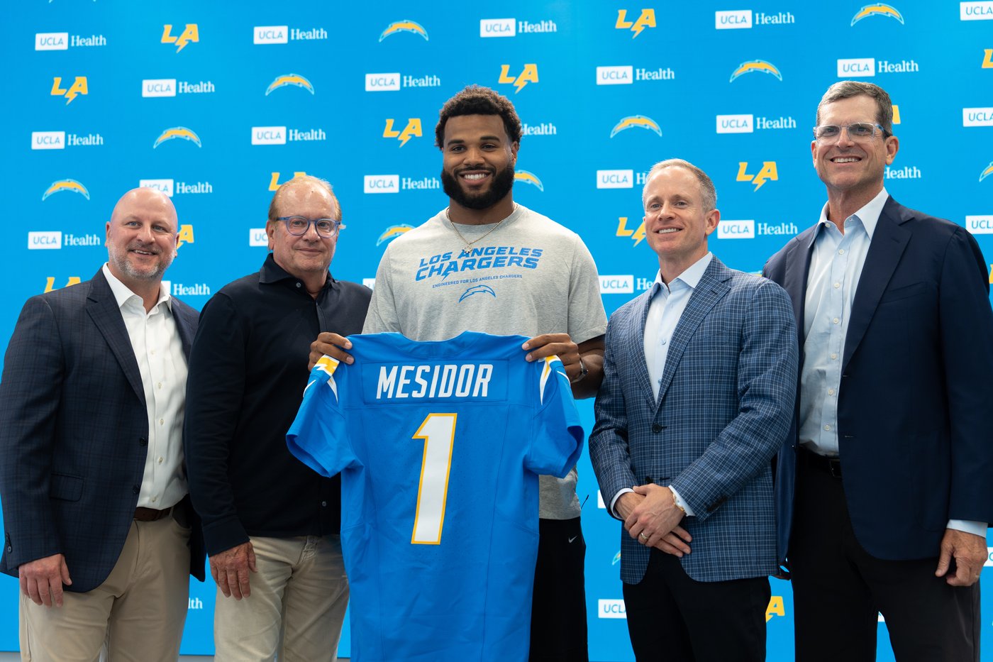 Chargers bet on the trenches, adding an edge rusher and a center-turned ...