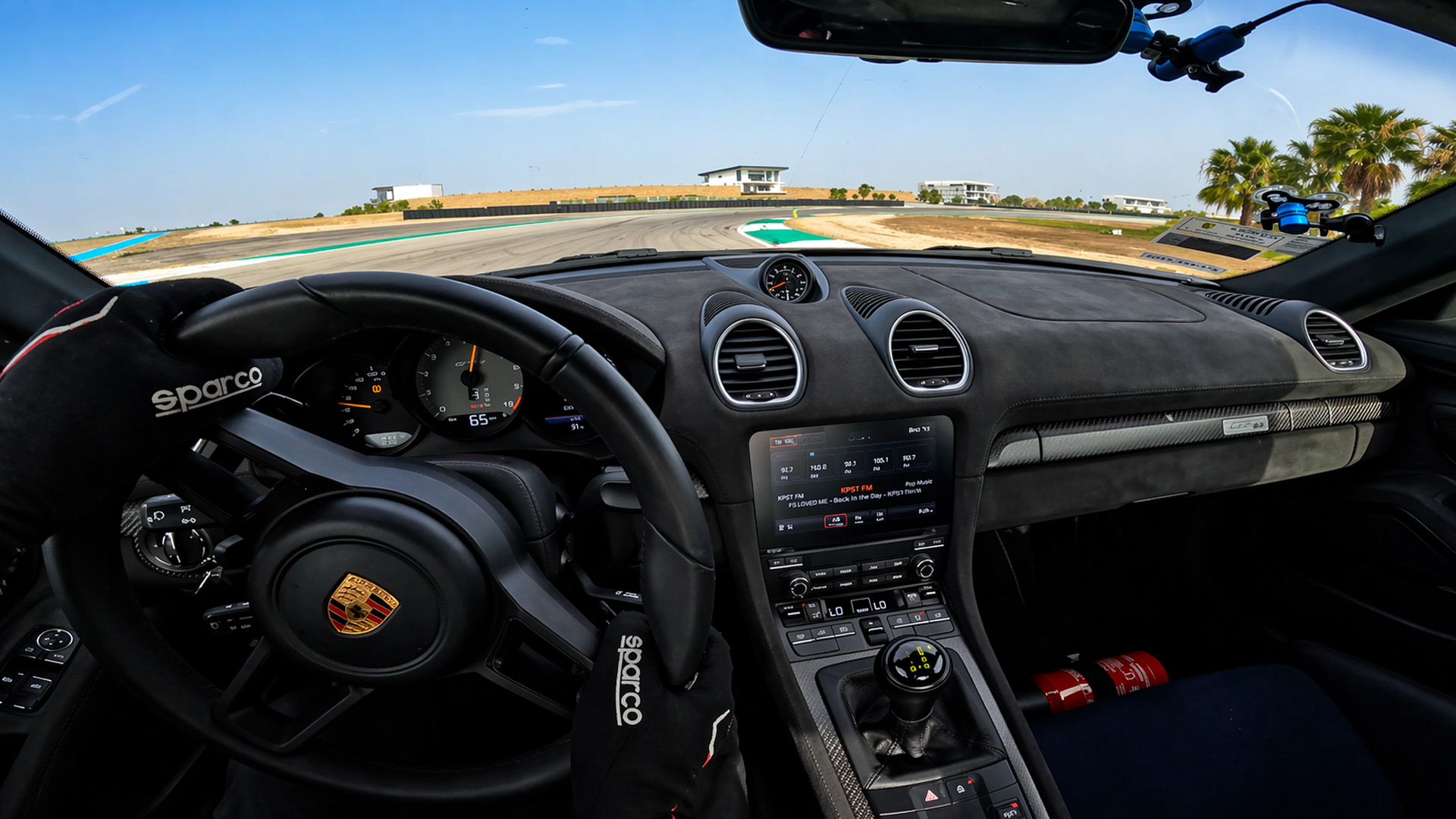 POV driving at full speed on track with Porsche GT4 RS