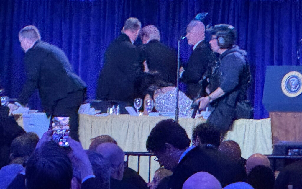 Videos show moment Trump evacuated after shots fired at Washington event