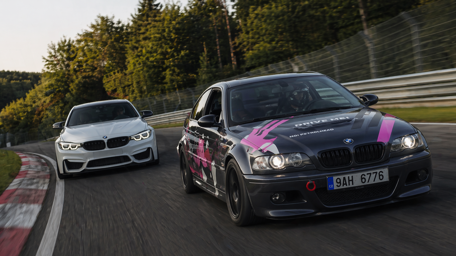 A racing legend battles in a BMW M3 on track
