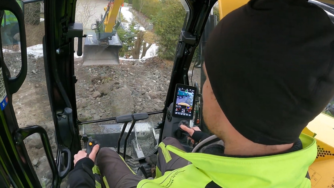 Inside a giant excavator: powerful control skills