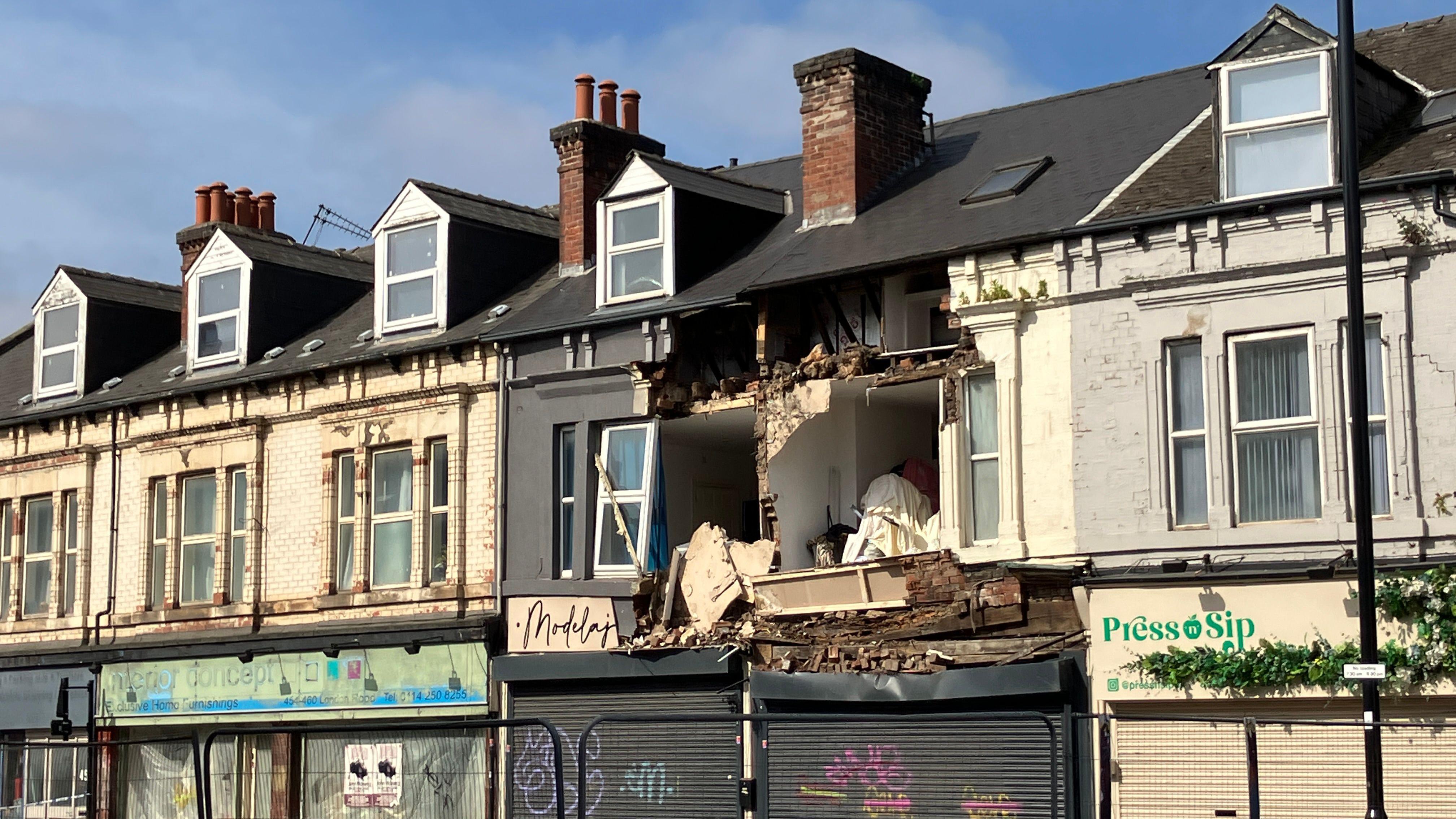 Flats evacuated after partial building collapse