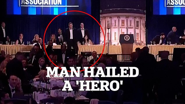 Man who jumped in front of Trump after shots fired hailed 'hero'