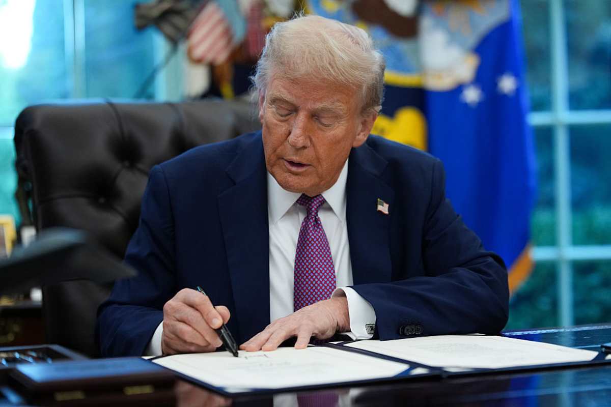 WASHINGTON, DC - SEPTEMBER 05: U.S. President Donald Trump signs executive orders during a press availability in the Oval Office of the White House on September 05, 2025 in Washington, DC. President Trump signed executive orders which included the renaming of the Department of Defense to the Department of War. (Photo by Kevin Dietsch/Getty Images)