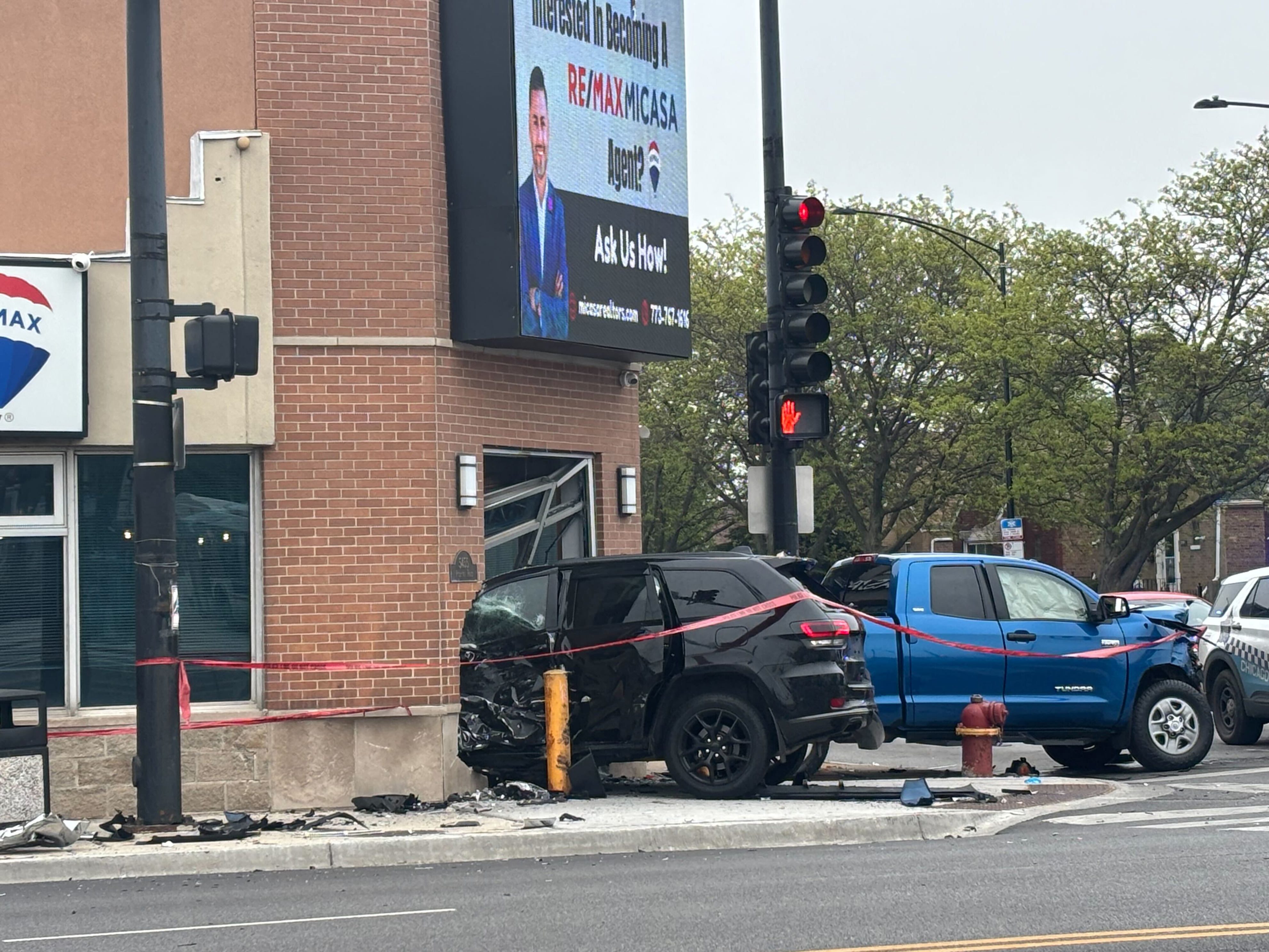 Driver in custody after crash sends SUV into building on Chicago's West ...