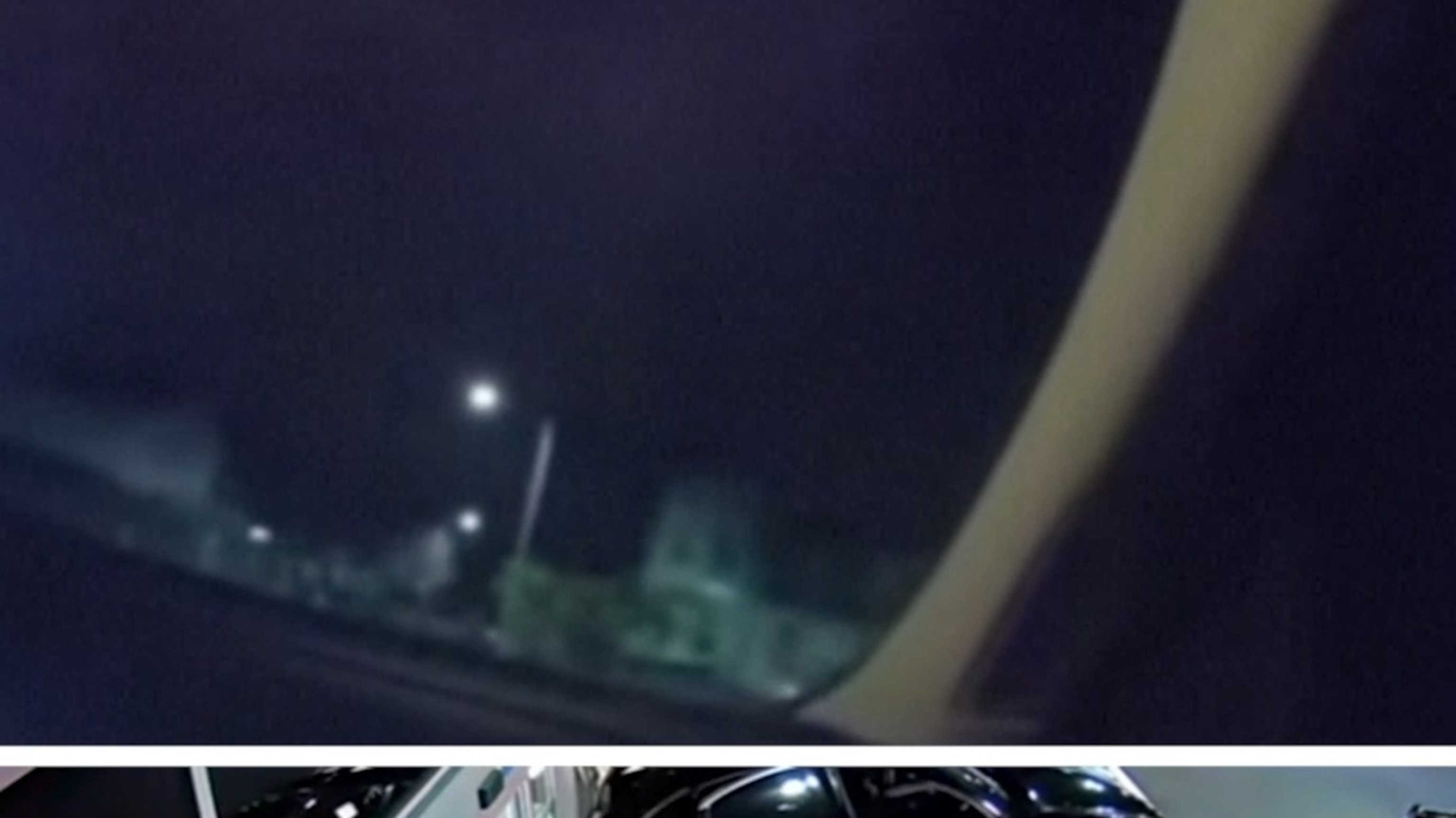 Newly released video shows suspect driving off with police officer in car