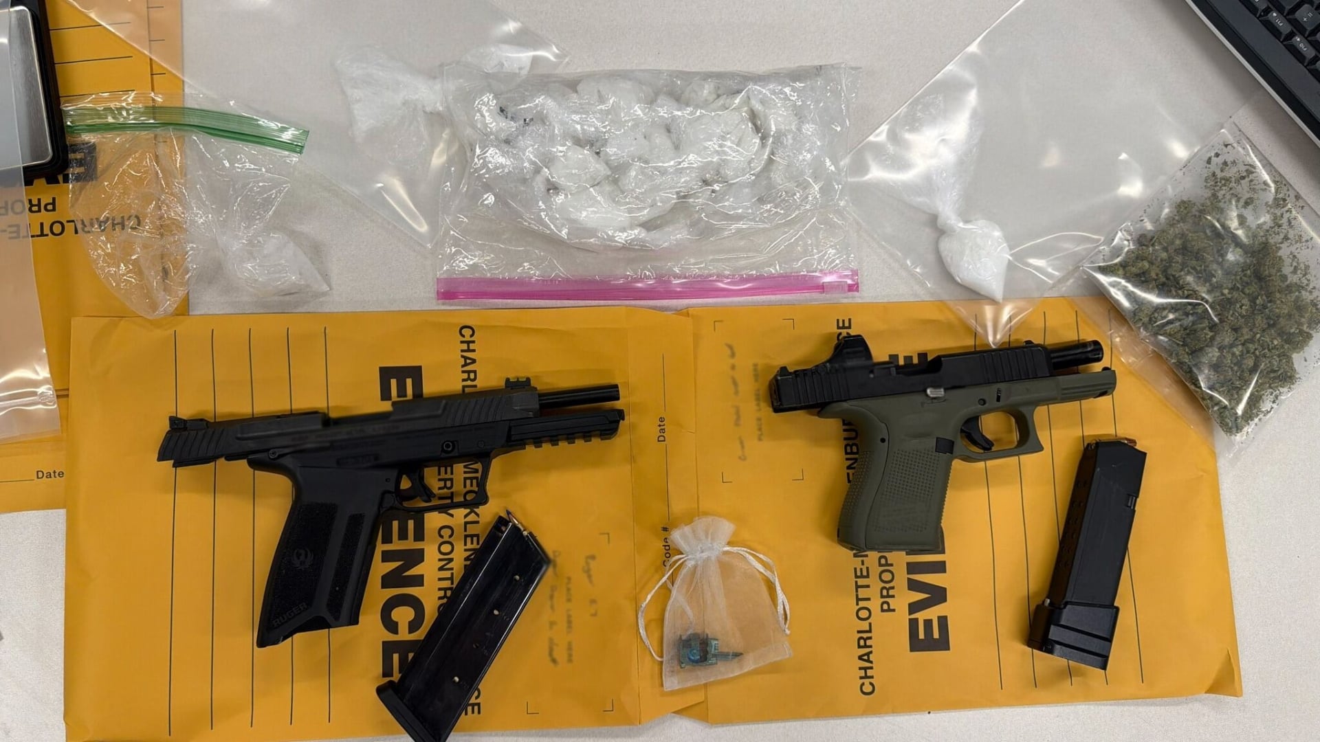 Juvenile arrested after CMPD recovers narcotics and stolen firearms