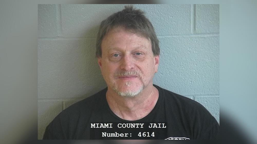 Man surrenders after hours-long standoff in Miami Co. neighborhood ...